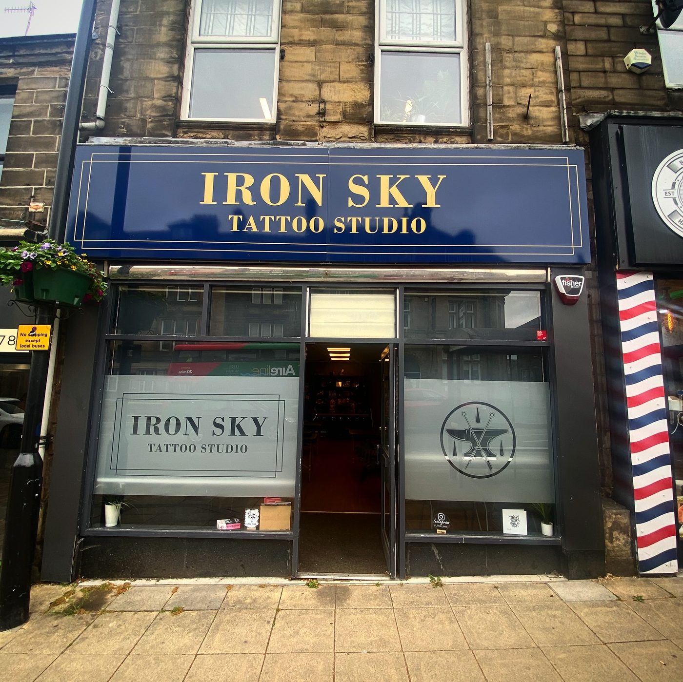 Iron Sky Tattoo Studio shopfront on Main Street, Bingley